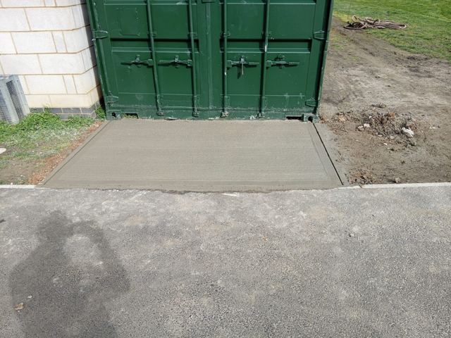 Container concrete access pad