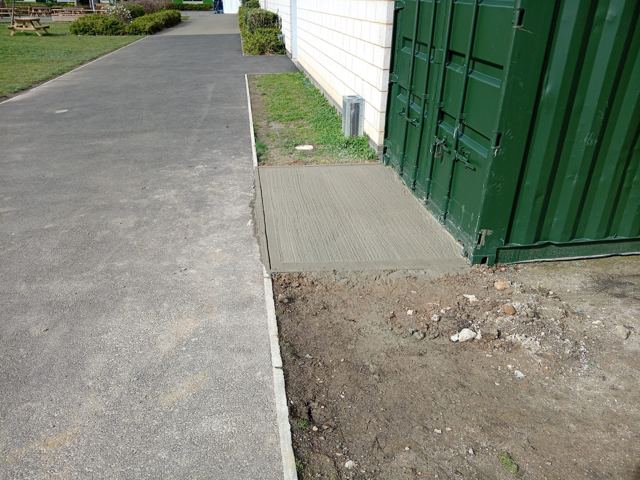 Container concrete access pad