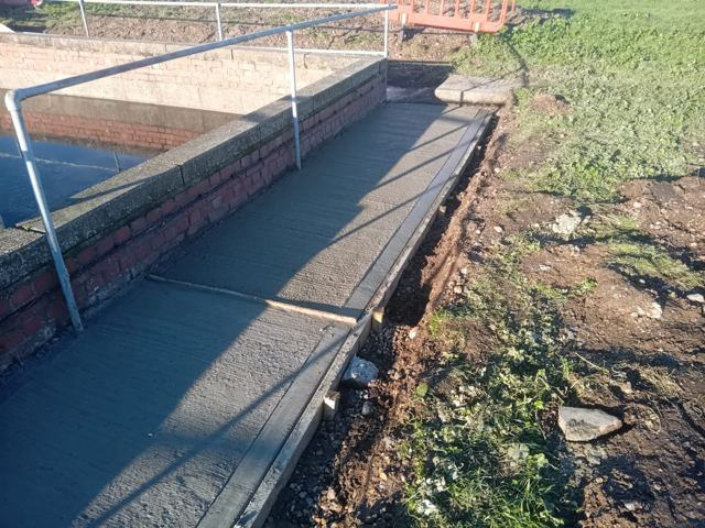 Water treatment concrete footpath